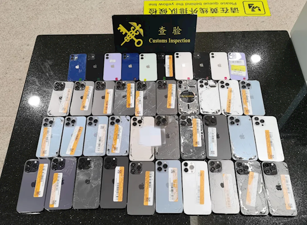 海關(guān)查獲2人身纏74臺iPhone入境：全是“洋垃圾”